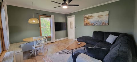 Cozy eat-in dining nook with bench seating — perfect for meals, games, or planning the day’s Duluth adventures.
