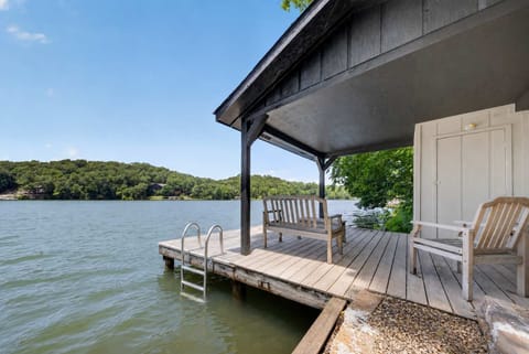 Covered lakeside dock, perfect for your personal swim dock, drinking morning coffee, or taking the paddle board or kayak out for an afternoon float.