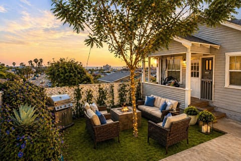 Sunset-ready patio: fire pit, BBQ, lounge seating & ocean views