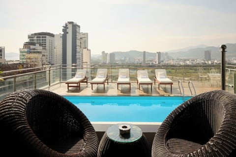 Outdoor pool, a rooftop pool, open 6:00 AM to 10:00 PM, sun loungers