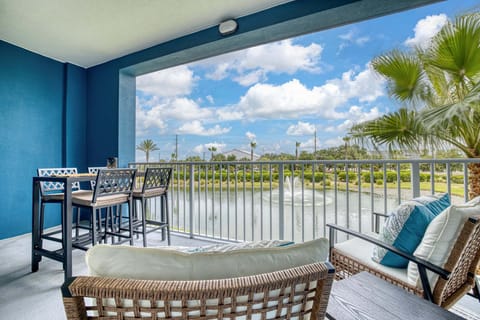 Enjoy outdoor dining, relaxing seating, and peaceful waterfront views from your private covered balcony.