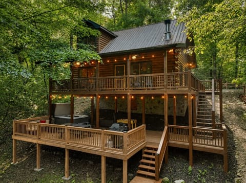 Luxury Blue Ridge cabin rental in Lake Buckhorn Estates, offering a peaceful creek setting with expansive outdoor living, at this North Georgia mountain getaway close to hiking and downtown Blue Ridge