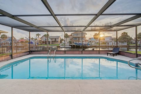 Moonlight Bay Pool with Lounge at Sunset