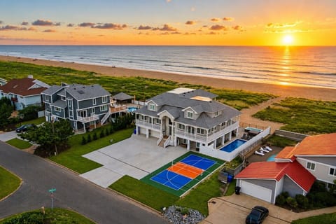 Wake up where luxury meets the Atlantic. This spectacular oceanfront estate offers direct beach access, a private pool, hot tub, swim spa, pickleball court, putting green, and breathtaking sunrises that make every morning unforgettable.