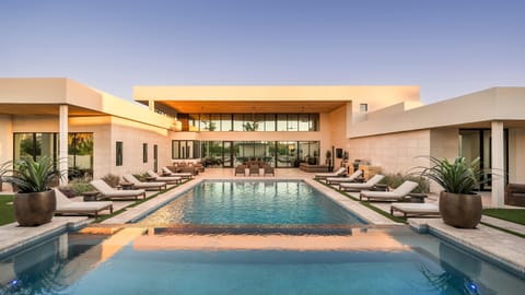 Stunning pool with plenty of lounge chairs