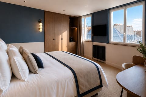 Deluxe Room, City View | Premium bedding, in-room safe, desk, laptop workspace