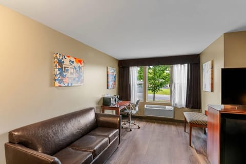 Suite, 1 King Bed with Sofa bed, Non Smoking | Desk, laptop workspace, iron/ironing board, free cribs/infant beds