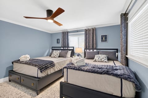 Family House, Patio, Canal View | Blackout drapes, iron/ironing board, WiFi (free), bed sheets