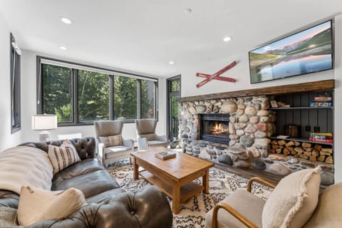 Living room with smart TV and fireplace