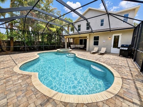 Your private screened pool and spa create the perfect backyard oasis for swimming, lounging, and enjoying sunny Florida days
