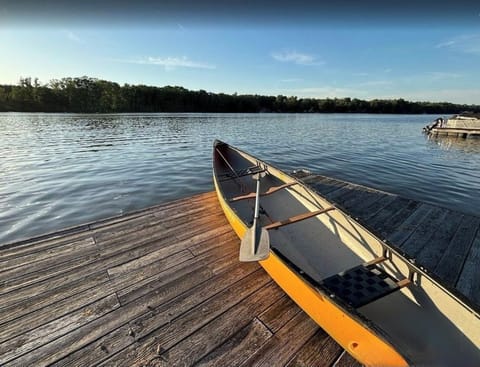 Lakefront escape with canoe and private dock—sunset paddles await