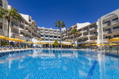 Indoor pool, outdoor pool, pool umbrellas, sun loungers