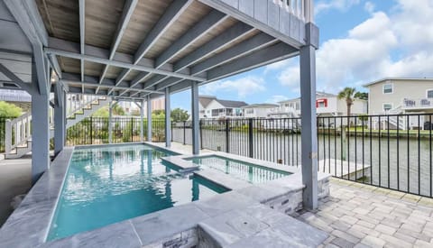 Private covered pool & lounge area. Cool off and relax in style!