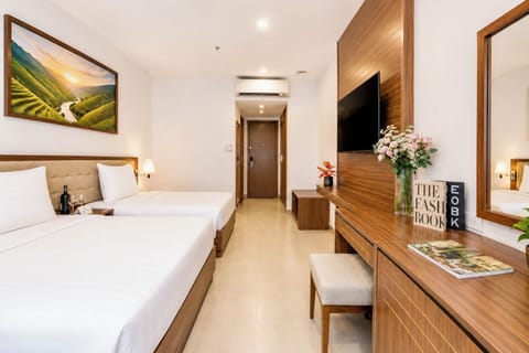 Family Triple Room, Garden View | In-room safe, desk, laptop workspace, blackout drapes
