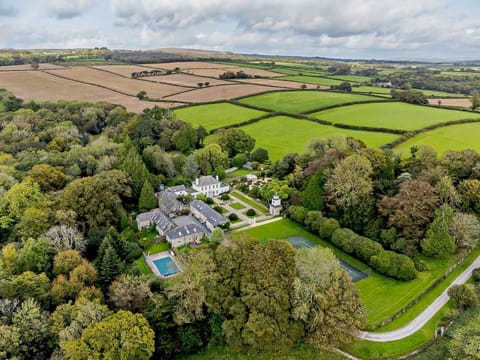 Birds eye view showing property setting within countryside grounds