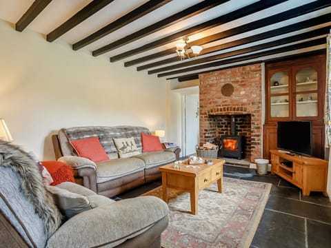 Welcoming lounge with comfy sofas and exposed beams