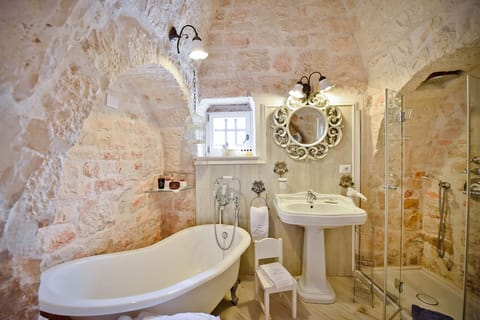 Superior Suite, 1 Bedroom (Trullo) | Bathroom | Shower, free toiletries, hair dryer, slippers