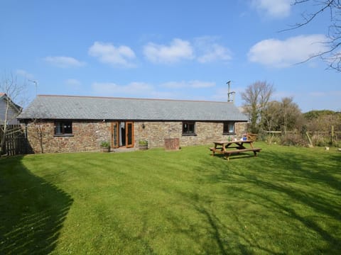 Looking towards the detached property from the spacious enclosed garden