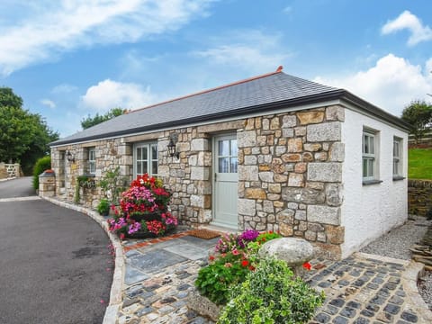 A warm welcome awaits at this pretty stone fronted cottage for two, set within farmland