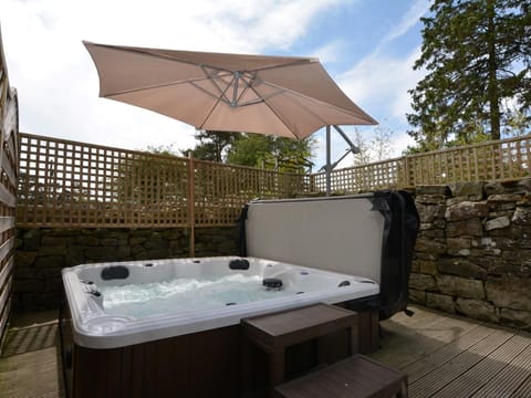 Indulge in the hot tub, straight off the bedroom, in the private garden