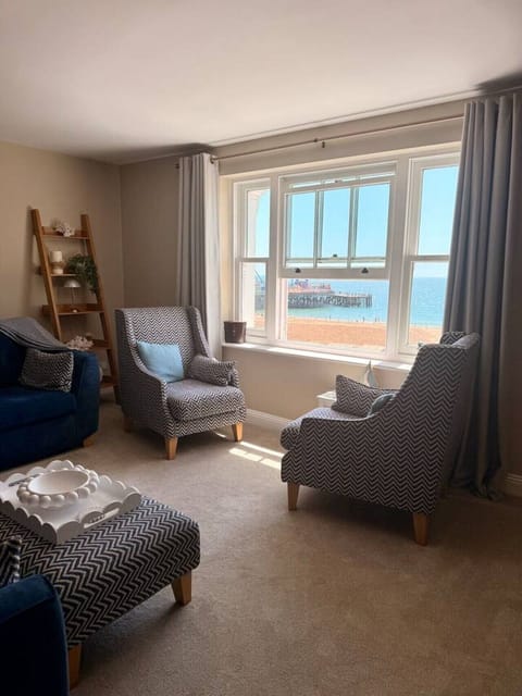 Relaxing open plan lounge with those amazing sea views
