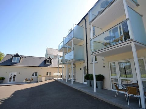View towards the stylish apartments on the right with ample parking