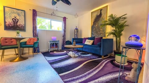 Galactic living room with Orgonite Generators, crystal bowls, and crystals