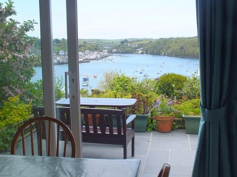 Patio doors lead to outdoor seating area