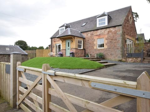 Views towards the property with fully enclosed garden and ample parking