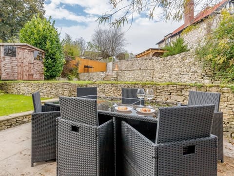 The outside space offers rattan furniture for those lazy summer evenings