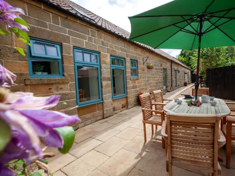Pretty rear patio with seating