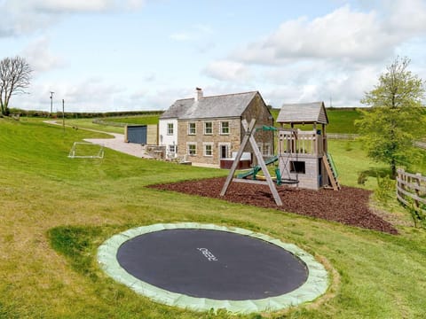 Countryside family retreat with hot tub and play area