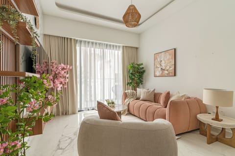Deluxe Apartment, 2 Bedrooms | Living area | 50-inch Smart TV with digital channels