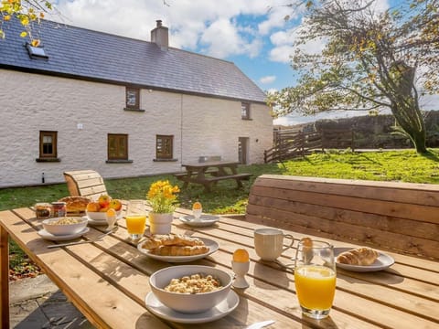 17th century barn, in a rural setting, with extensive views