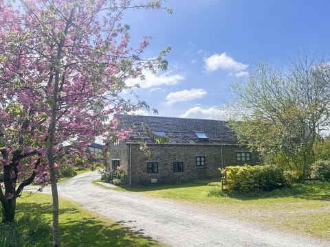 Traditional stone barn situated on a working farm in a quiet rural area