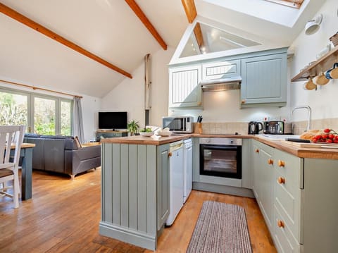 Vaulted ceilings give a lovely feel to the open plan living space