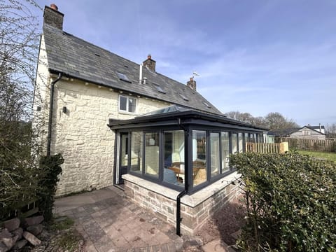 The newly added garden room lets you enjoy the outdoors from inside