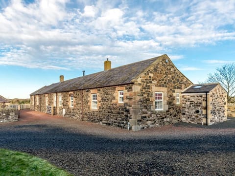 View of this lovely stone cottage with dune views 