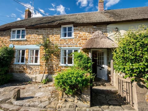 Looking towards this charming thatched cottage