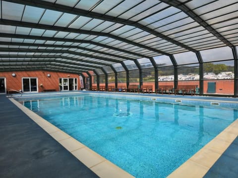 Shared covered outdoor heated swimming pool - please refer to property description for details