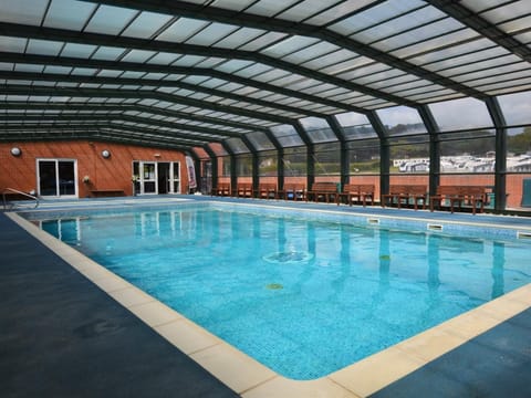 Take a dip in the shared covered outdoor heated swimming pool - please refer to property description for details