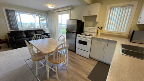 Premier Suite, 2 Bedrooms | Living area | 43-inch Smart TV with cable channels, TV