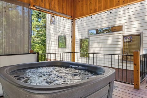 Covered hot tub gazebo for year-round relaxation