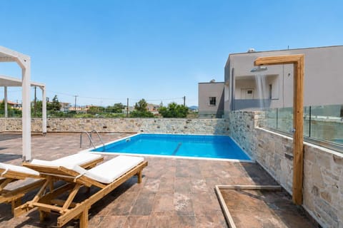 Private pool with sun loungers and a peaceful outdoor retreat