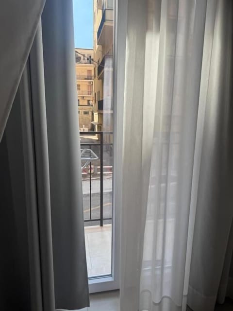 Family Quadruple Room, Balcony, City View | Interior
