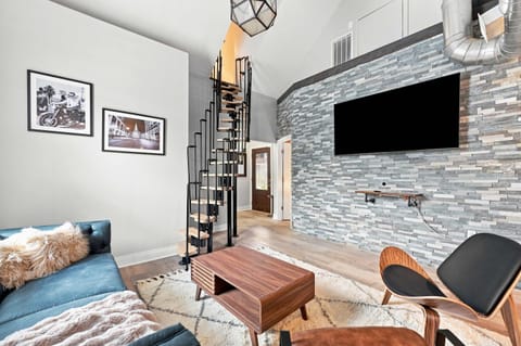 Living room with loft access