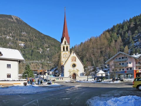 Sky, Mountain, Window, Building, Snow, Tree, Mountainous Landforms, Public Space, Freezing, Landscape