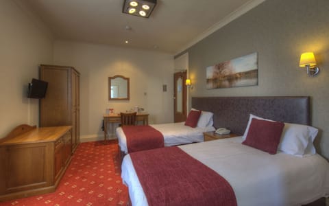 Twin Room | Desk, blackout drapes, free WiFi, bed sheets