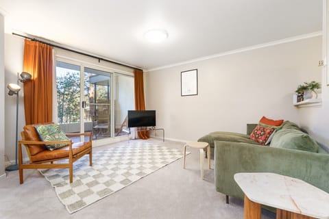 Sink into the comfy lounge, soak up the natural light and relax beside the cosy fireplace after a day out.