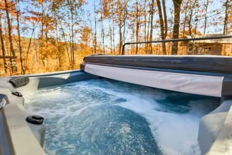 Relax and recharge in the private hot tub, complete with soothing massage jets. It's the perfect place to unwind after a day of exploring or simply enjoy a peaceful evening under the stars.